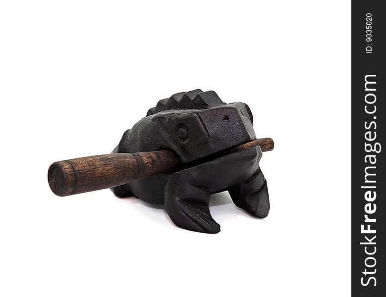 Wooden musical instrument shaped like frog. Wooden musical instrument shaped like frog