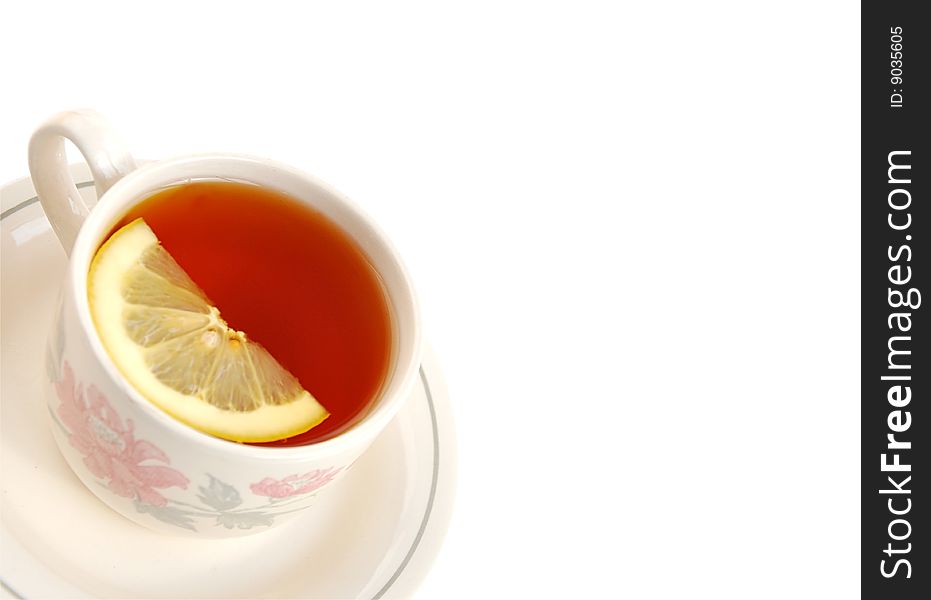 Cup of Tea with lemon slice isolated over white. Cup of Tea with lemon slice isolated over white.