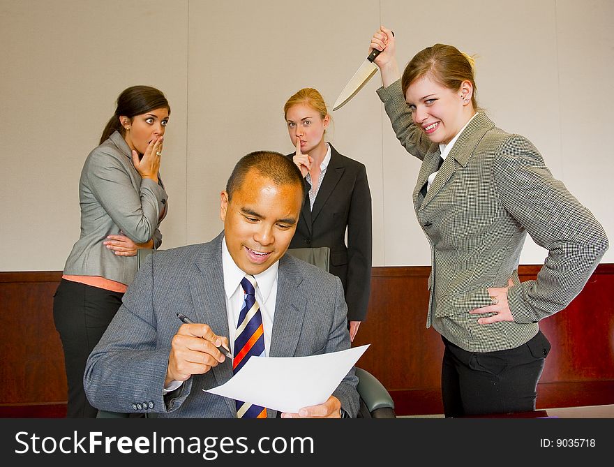 Team member stabbing the manager in the back