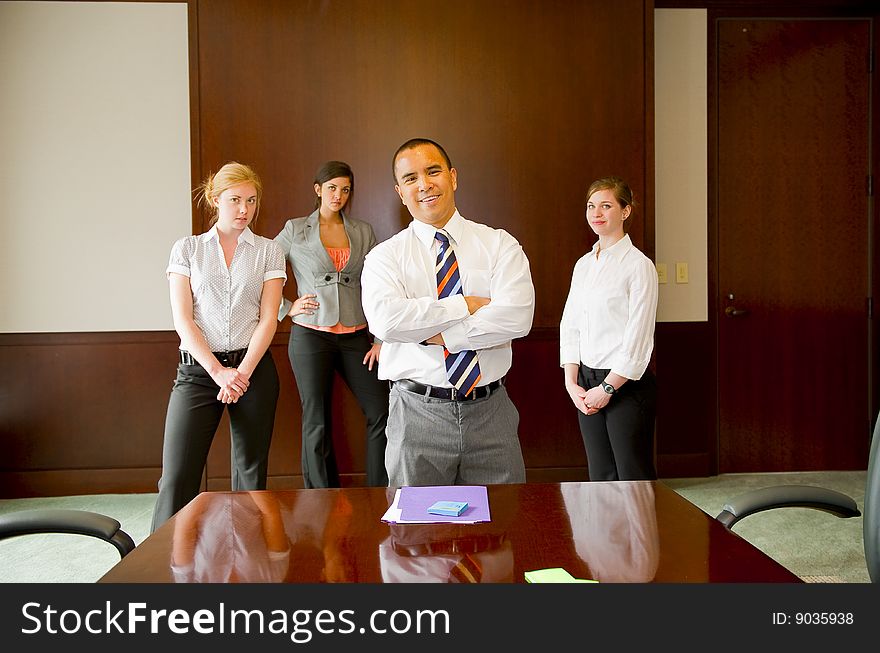 Team Meeting with Male in Foreground