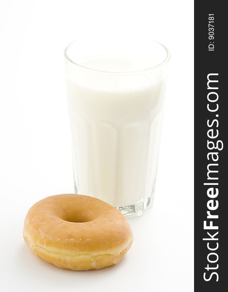 Breakfast glass of chocolate milk and donut