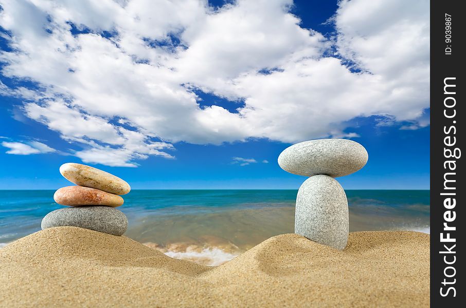 Landscape with stones on sky background