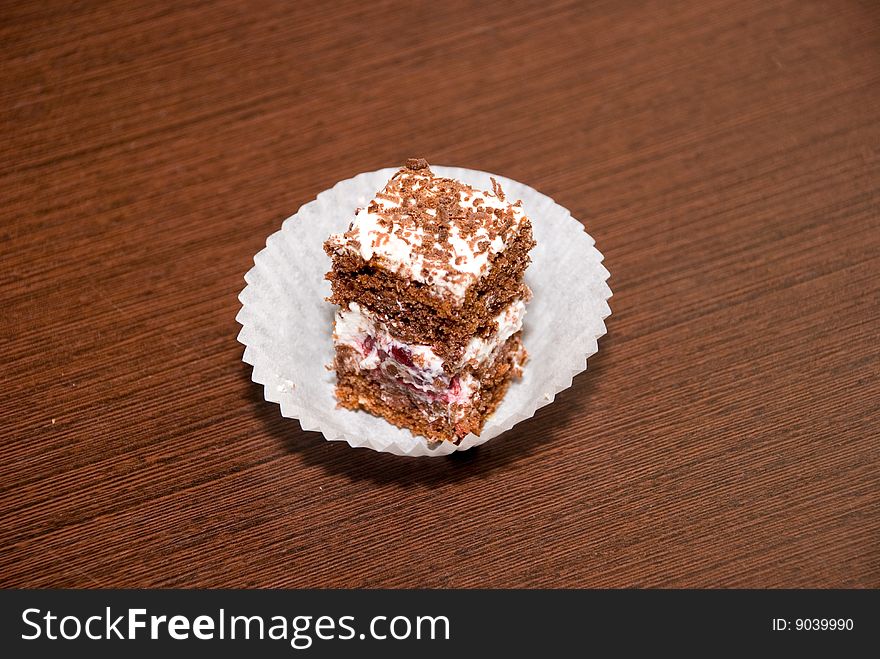 Biscuit cakes in a chocolate shaving