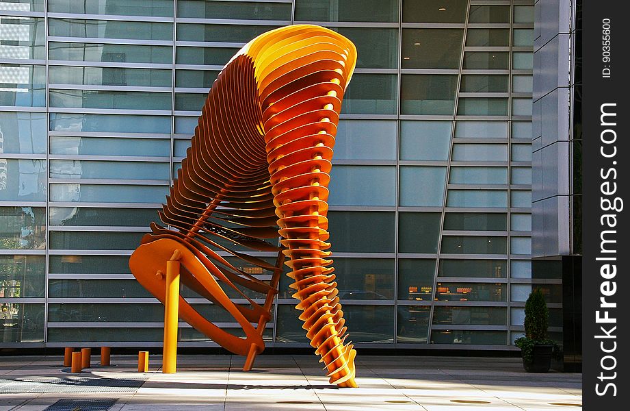 Calgarians welcomed a new piece of public sculpture downtown during the summer of 2002. John McEwen&#x27;s “Weaving Fence and Horn” sits on the corner of 1 Street and 4 Avenue SW in front of the TransCanada Tower. Installed in June, the sculpture consists of two components— a metal ram&#x27;s horn and a fence. According to the artist, the weaving refers to the undulation of fences as they snake across the rolling prairies and to the weaving of dialogue between fence and horn. The sculpture will also function as a windbreak, reducing the blustery nature of one of downtown Calgary&#x27;s windiest street corners.