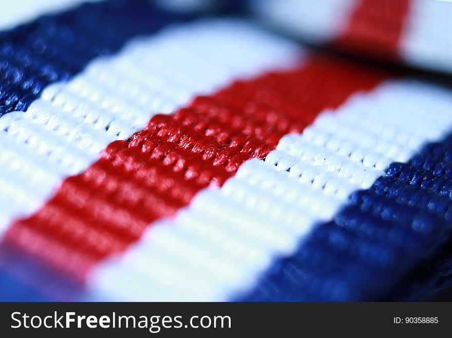 Macro view of red, white and blue striped thread background. Macro view of red, white and blue striped thread background.