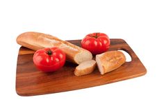 Two Tomatoes And Slices Of Baguette Royalty Free Stock Photography Two Tomatoes And Slices Of Baguette Royalty Free Stock Photography