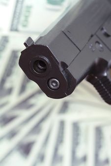 Gun And Money Stock Images