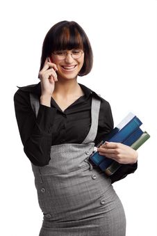 Smiled Brunette Schoolgirl Talking By Phone Stock Photography Smiled Brunette Schoolgirl Talking By Phone Stock Photography