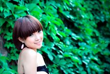 Chinese Pretty Girl In A Park Royalty Free Stock Images