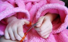 Child Cuts Nails Stock Images