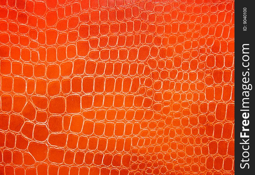 Artificial skin of a crocodile an abstract background. Artificial skin of a crocodile an abstract background