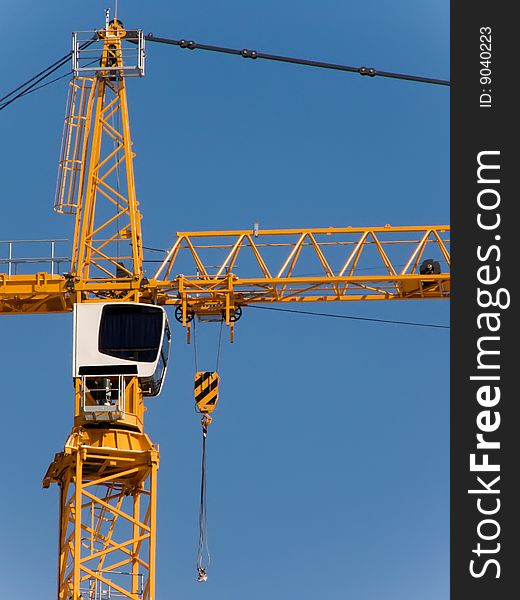 Cabin of the elevating crane against the sky. Cabin of the elevating crane against the sky