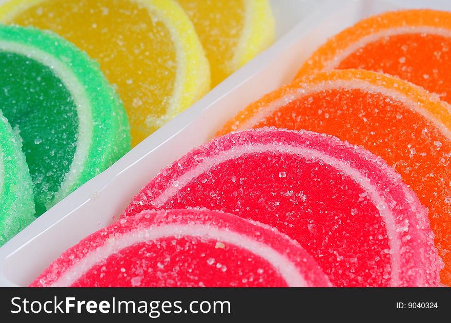 Colorful fruit jelly sweets closeup. Colorful fruit jelly sweets closeup