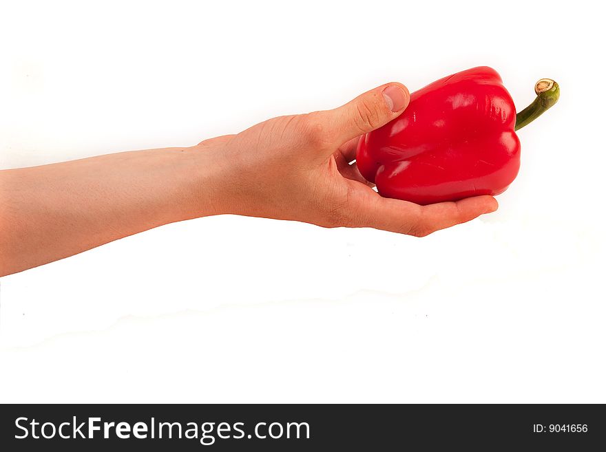 Hand Giving Red Pepper