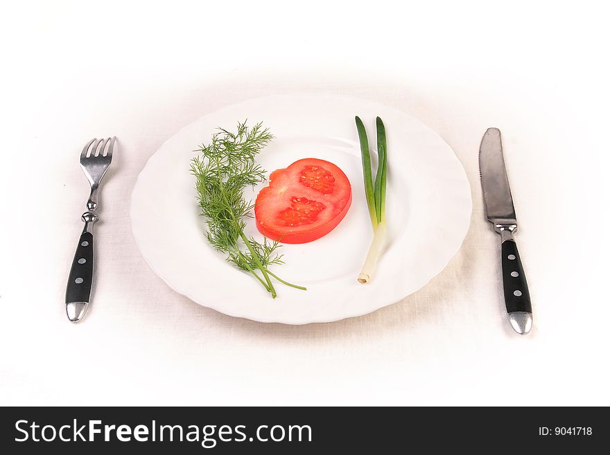 Tomato, dill and spring onion on plate. Tomato, dill and spring onion on plate