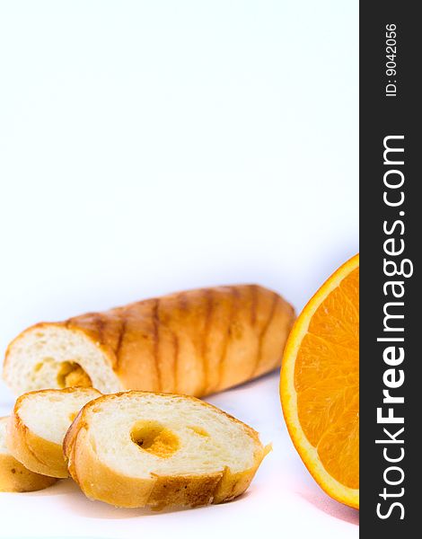 Bread and oranges with whit background. Bread and oranges with whit background