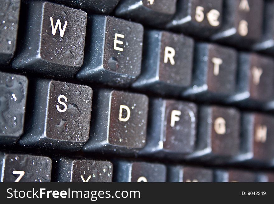 Keyboard with dew droplets or moist.