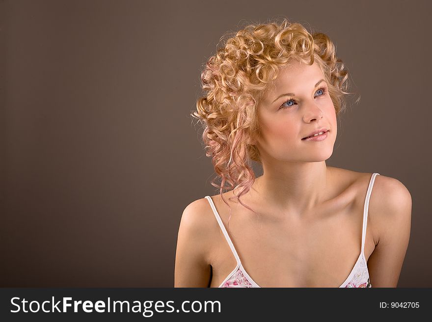 Portrait of a beautiful sexy woman with professional hair-style