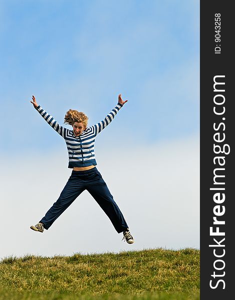 Outdoor portrait of teenage girl jumping. Outdoor portrait of teenage girl jumping