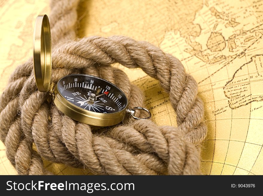 Old compass and rope