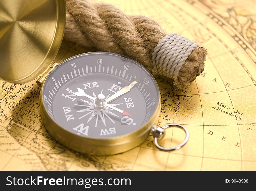 Old compass and rope