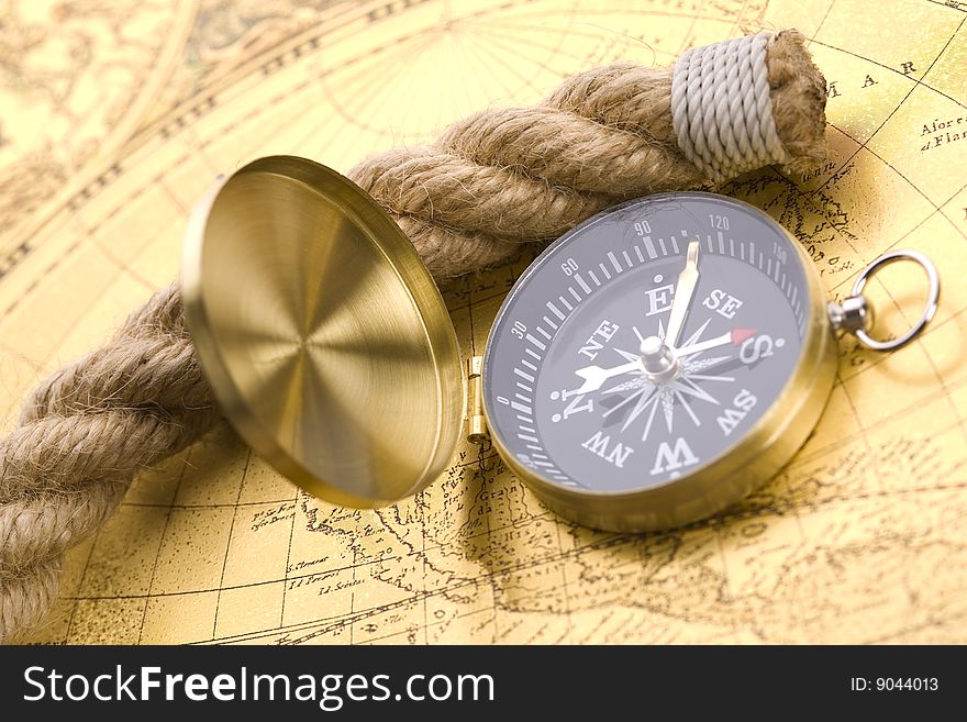 Old compass and rope