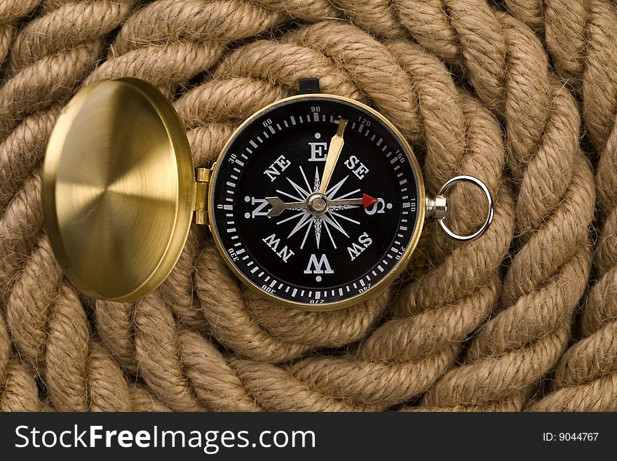 Old compass and rope