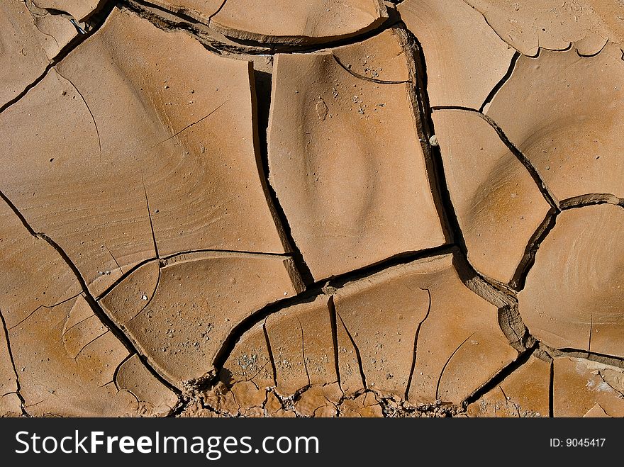Dried and cracked desert soil. Dried and cracked desert soil