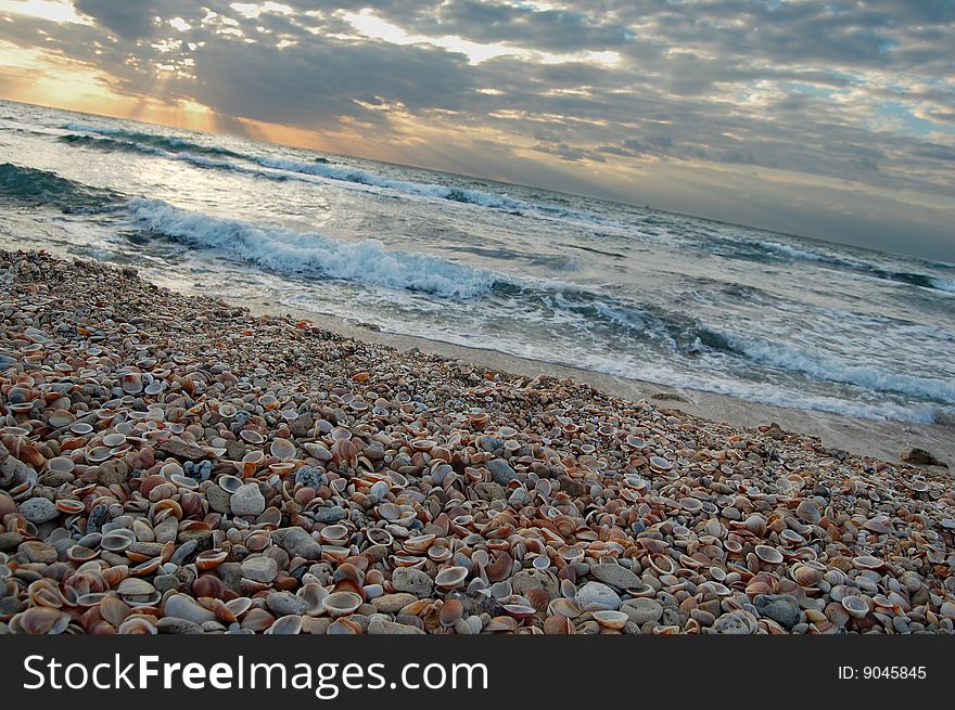 Sunset on sandy beach