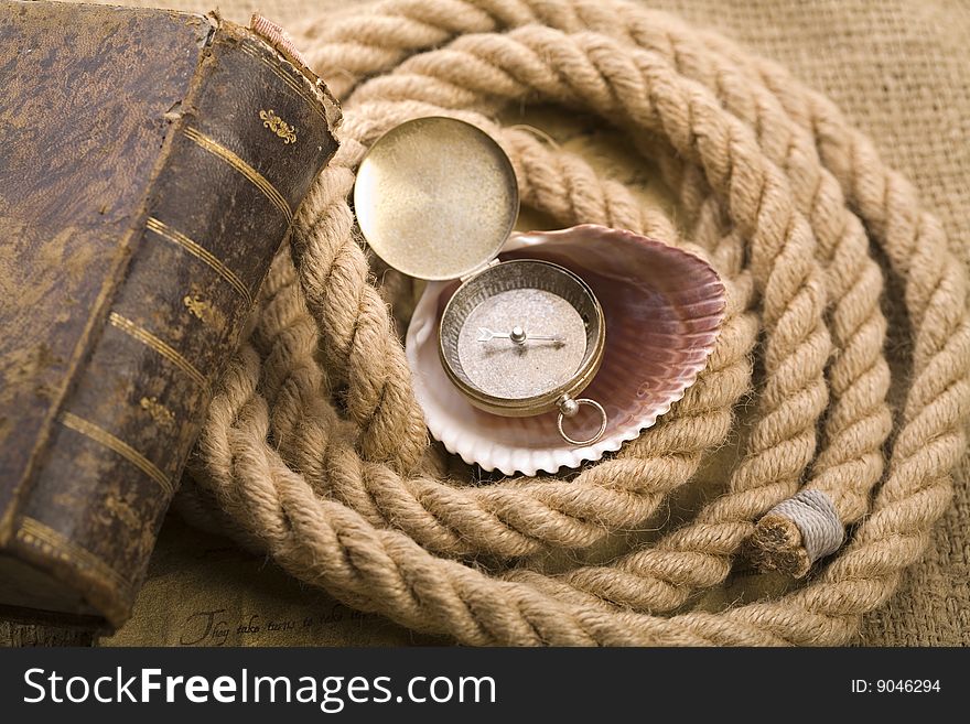 Old compass and rope