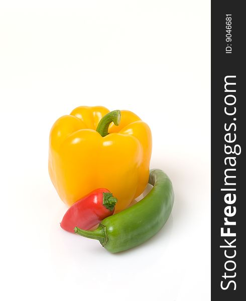 Yellow bell pepper with Anaheim and mini peppers. Yellow bell pepper with Anaheim and mini peppers