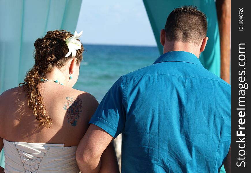 Saying marriage vows is serious business even at a beach wedding at a mexican resort.