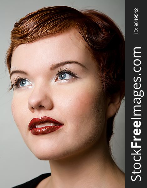 Close Up Portrait Of Red-head Woman