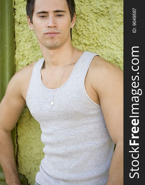 A young male model from Brazil in outdoors photograph. A young male model from Brazil in outdoors photograph.