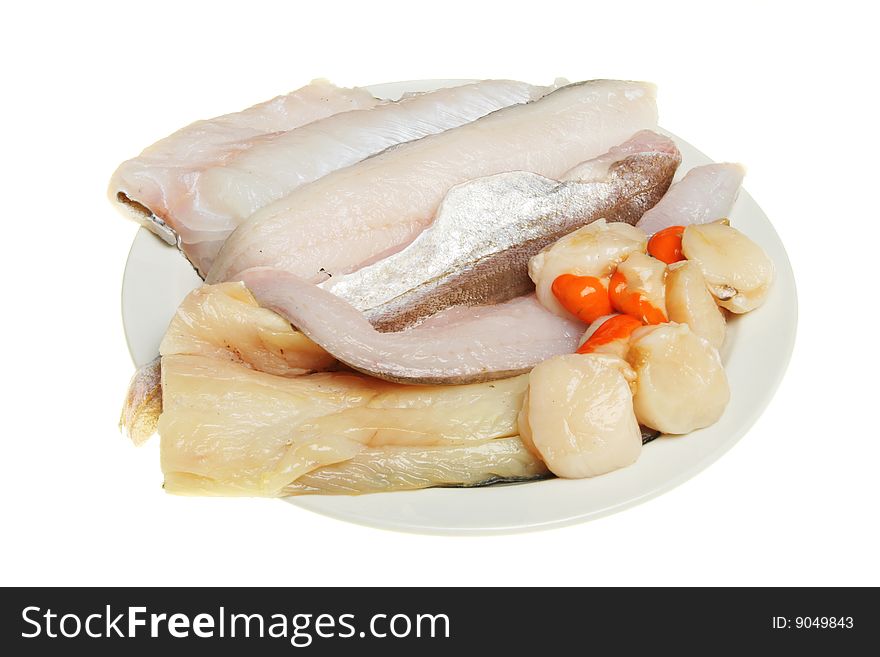 Mixed fresh raw fish on a plate. Mixed fresh raw fish on a plate