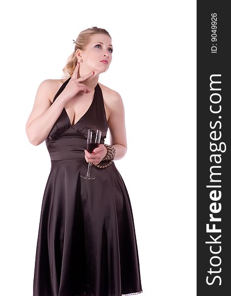 Woman in brown dress with a glass of wine on a white background. Woman in brown dress with a glass of wine on a white background