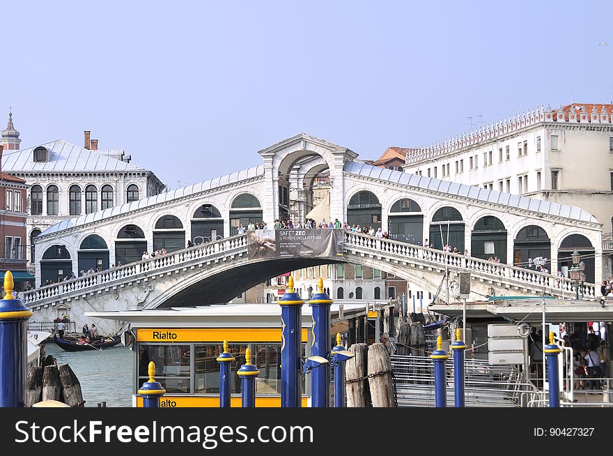 The water streets of Venice are canals which are navigated by gondolas and other small boats. During daylight hours the canals, bridges, and streets of Venice are full of tourists eager to experience the romance of this great travel destination. As night engulfs the town, tourists enjoy some fine dining at one of the many restaurants, leaving the waterways and streets quiet. The gondola is a traditional, flat-bottomed Venetian rowing boat, well suited to the conditions of the Venetian Lagoon. For centuries gondolas were once the chief means of transportation and most common watercraft within Venice. In modern times the iconic boats still have a role in public transport in the city, serving as ferries over the Grand Canal. They are also used in special regattas &#x28;rowing races&#x29; held amongst gondoliers. Their main role, however, is to carry tourists on rides throughout the canals. Gondolas are hand made using 8 different types of wood &#x28;fir, oak, cherry, walnut, elm, mahogany, larch and lime&#x29; and are composed of 280 pieces. The oars are made of beech wood. The left side of the gondola is longer than the right side. This asymmetry causes the gondola to resist the tendency to turn toward the left at the forward stroke. The water streets of Venice are canals which are navigated by gondolas and other small boats. During daylight hours the canals, bridges, and streets of Venice are full of tourists eager to experience the romance of this great travel destination. As night engulfs the town, tourists enjoy some fine dining at one of the many restaurants, leaving the waterways and streets quiet. The gondola is a traditional, flat-bottomed Venetian rowing boat, well suited to the conditions of the Venetian Lagoon. For centuries gondolas were once the chief means of transportation and most common watercraft within Venice. In modern times the iconic boats still have a role in public transport in the city, serving as ferries over the Grand Canal. They are also used in special regattas &#x28;rowing races&#x29; held amongst gondoliers. Their main role, however, is to carry tourists on rides throughout the canals. Gondolas are hand made using 8 different types of wood &#x28;fir, oak, cherry, walnut, elm, mahogany, larch and lime&#x29; and are composed of 280 pieces. The oars are made of beech wood. The left side of the gondola is longer than the right side. This asymmetry causes the gondola to resist the tendency to turn toward the left at the forward stroke.