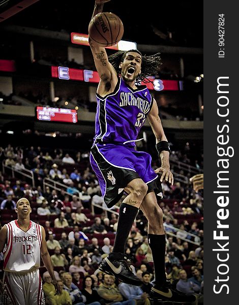 The number 33 of Sacramento Kings during seasons 2007-2009, Mikki Moore Dunking the basketball in Houston Rockets - Sacramento Kings. The number 33 of Sacramento Kings during seasons 2007-2009, Mikki Moore Dunking the basketball in Houston Rockets - Sacramento Kings.