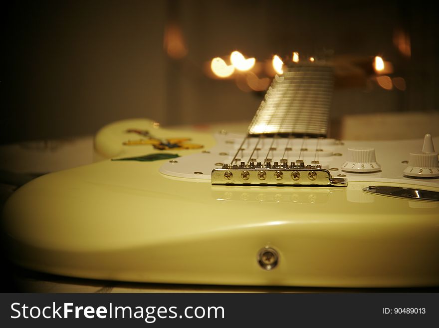 Yellow and White Stratocaster Electric Guitar