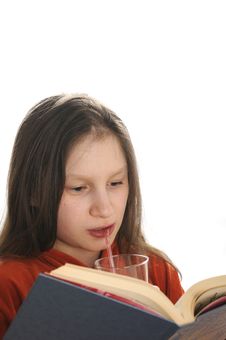 Reading Girl With Glass Of Juice Royalty Free Stock Image