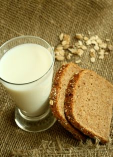 Glass Of Milk And Bread On A Sacking Stock Photos Glass Of Milk And Bread On A Sacking Stock Photos