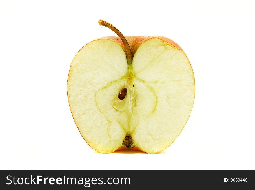 Half of apple isolated over white. Half of apple isolated over white