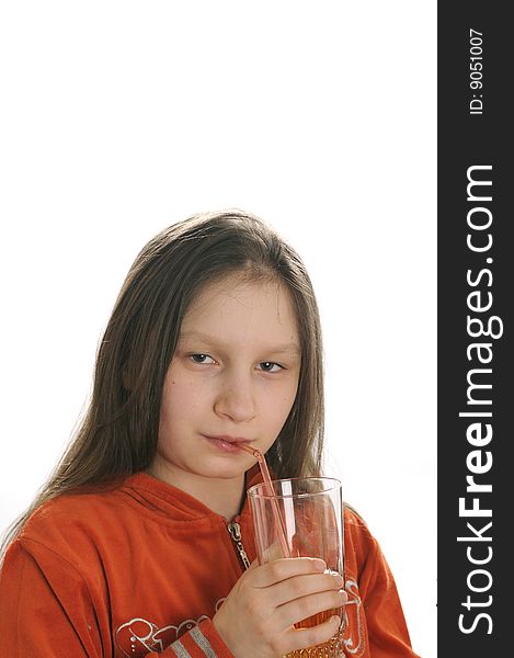 Young girl reading a book and drinking a fresh juice. Young girl reading a book and drinking a fresh juice