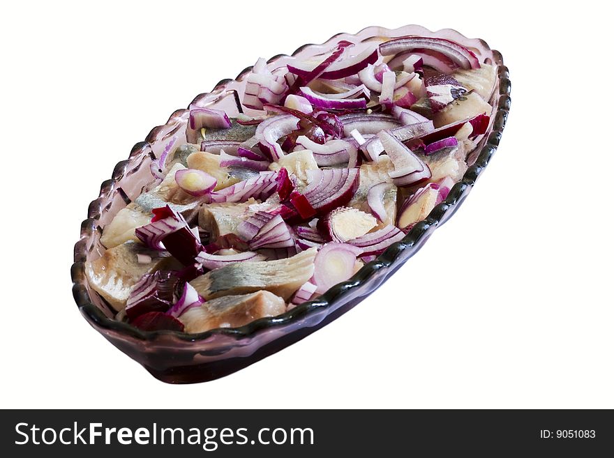 Sliced herring served with fresh red onion. Sliced herring served with fresh red onion