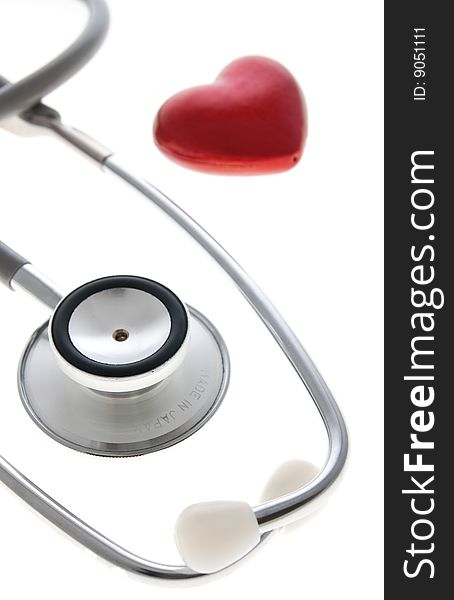 Stethoscope and heart isolated on the white. Stethoscope and heart isolated on the white