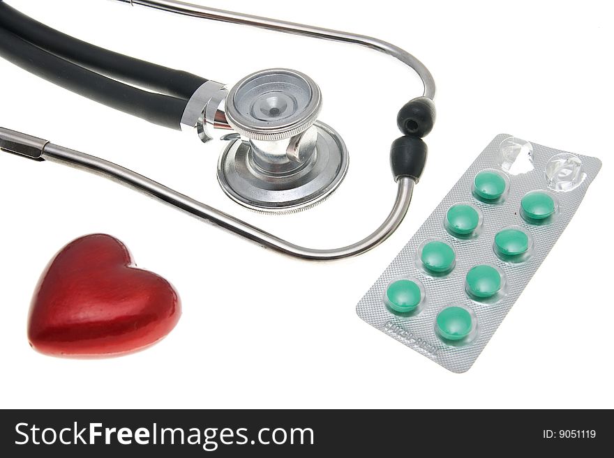 Stethoscope and heart isolated on the white. Stethoscope and heart isolated on the white