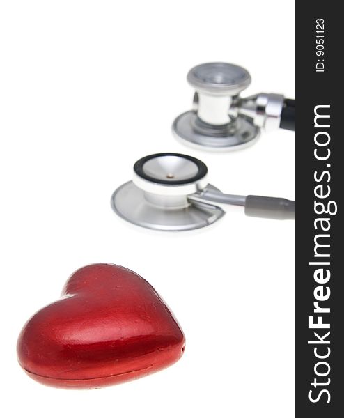 Stethoscope and heart isolated on the white. Stethoscope and heart isolated on the white
