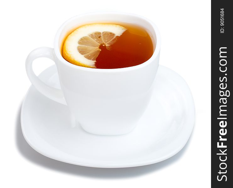 Cup of tea with lemon and saucer, isolated on white. Cup of tea with lemon and saucer, isolated on white