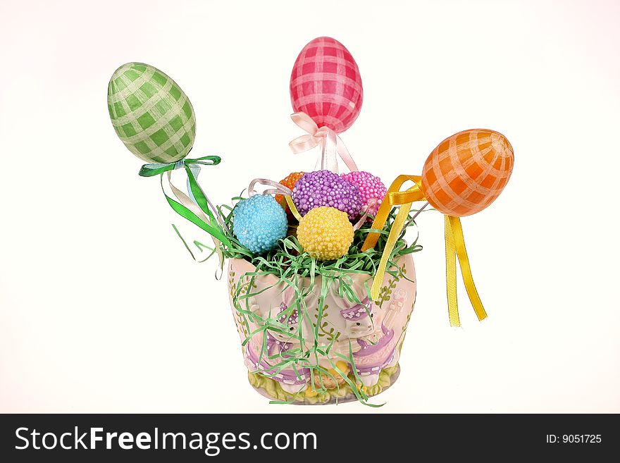 Easter eggs in the bucket isolated on white background