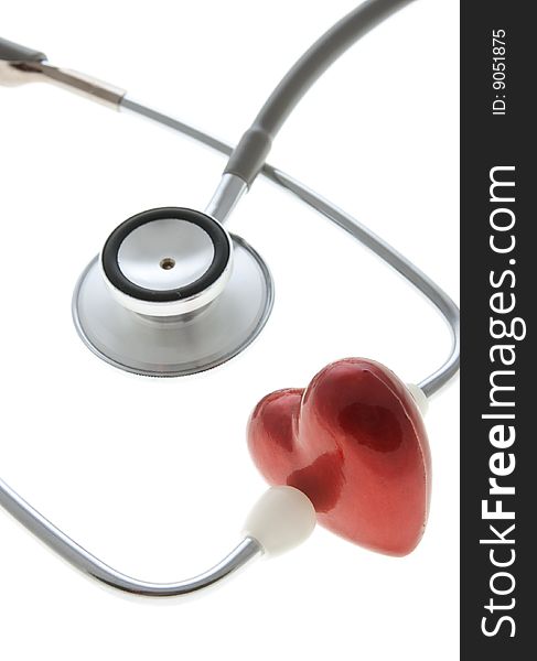 Stethoscope and heart isolated on the white. Stethoscope and heart isolated on the white